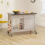Taupe colored kitchen island on caster wheels